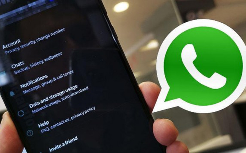 Así lucen los dos modos oscuros de WhatsApp para iPhone